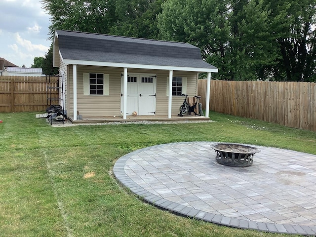 374 Chatham Rd, Circleville, OH 43113 - view of outdoor structure with an outdoor fire pit and a fenced backyard