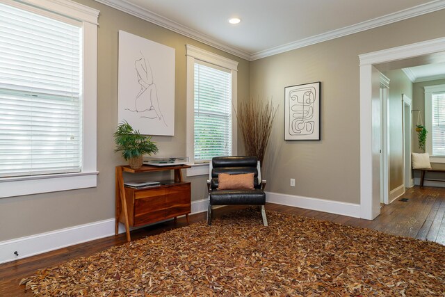 489 Elsmere St, Columbus, OH 43206 - living area featuring wood-type flooring, crown molding, and recessed lighting