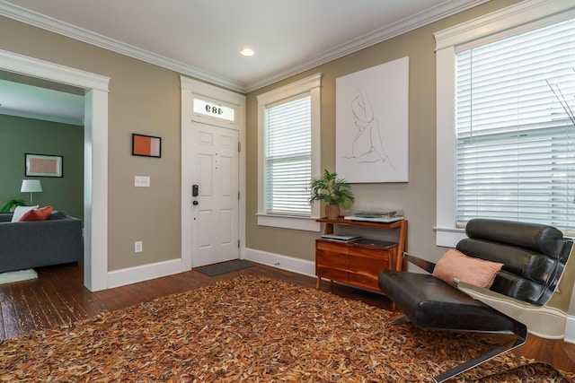 489 Elsmere St, Columbus, OH 43206 - foyer with wood finished floors, crown molding, and recessed lighting