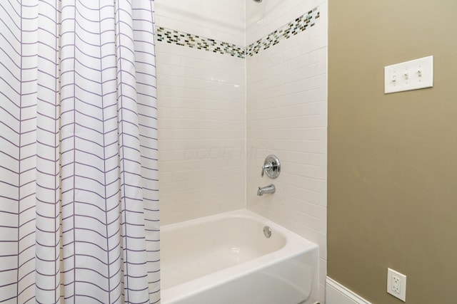 489 Elsmere St, Columbus, OH 43206 - bathroom with shower / tub combo and baseboards