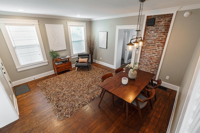489 Elsmere St, Columbus, OH 43206 - dining area with wood-type flooring and crown molding
