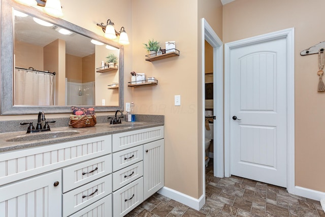 5582 Hayesville Rd, Circleville, OH 43113 - bathroom with stone finish floors, double vanity, and a shower with shower curtain