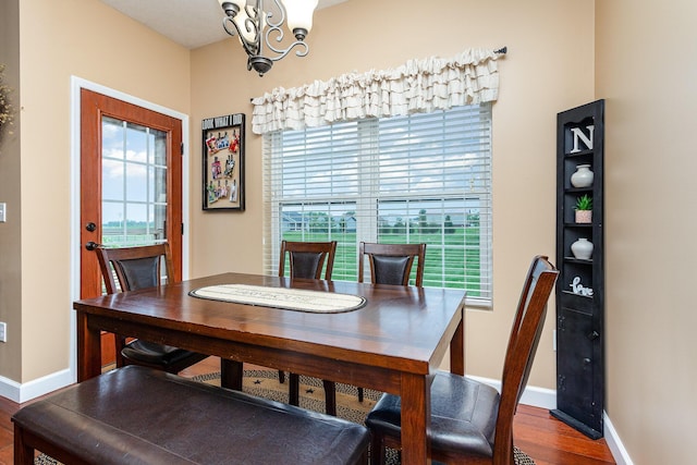 5582 Hayesville Rd, Circleville, OH 43113 - dining room featuring a chandelier and wood finished floors