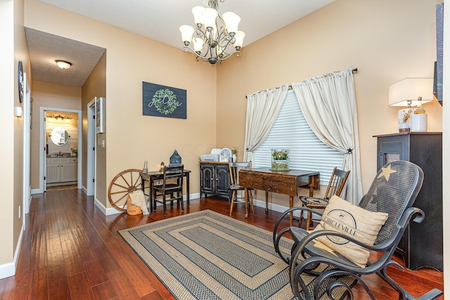 5582 Hayesville Rd, Circleville, OH 43113 - living area featuring a chandelier, wood-type flooring, and a desk