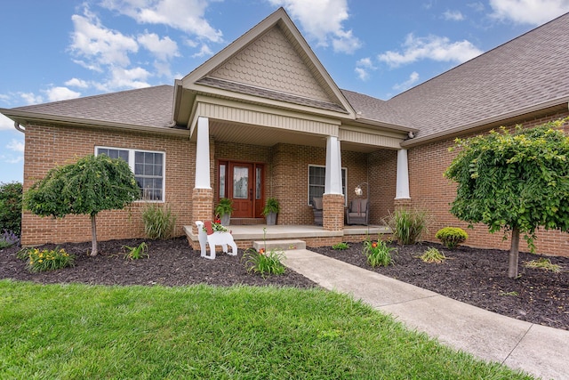 5582 Hayesville Rd, Circleville, OH 43113 - view of front of home featuring covered porch, roof with shingles, and brick siding