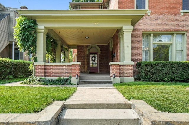 249 W Locust St, Newark, OH 43055 - property entrance featuring brick siding and covered porch