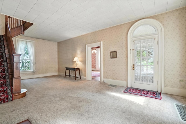 249 W Locust St, Newark, OH 43055 - foyer entrance with carpet floors and wallpapered walls