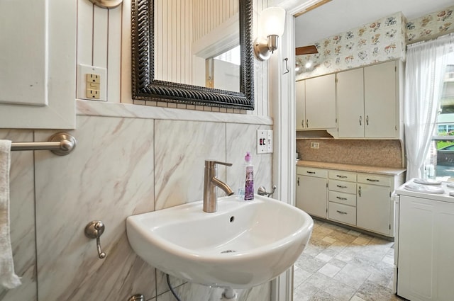 249 W Locust St, Newark, OH 43055 - bathroom featuring stone finish flooring and tasteful backsplash