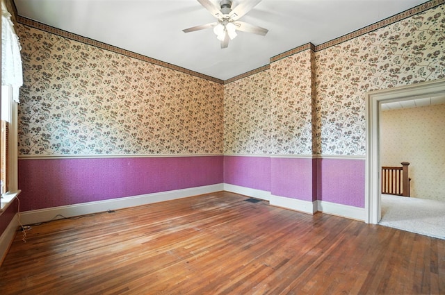 249 W Locust St, Newark, OH 43055 - unfurnished room featuring wallpapered walls, a ceiling fan, and hardwood / wood-style flooring
