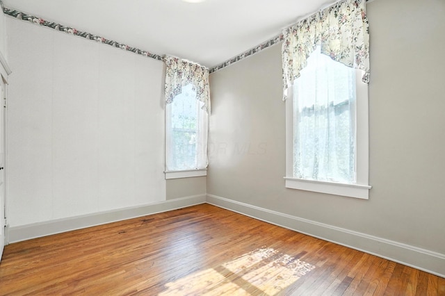 249 W Locust St, Newark, OH 43055 - empty room with hardwood / wood-style floors and baseboards