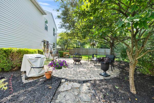 5813 Camhurst Ct, Galloway, OH 43119 - view of patio featuring a fire pit