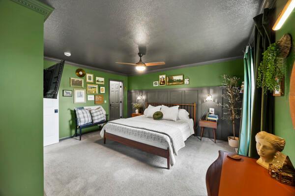5813 Camhurst Ct, Galloway, OH 43119 - bedroom with a textured ceiling, carpet flooring, and a ceiling fan
