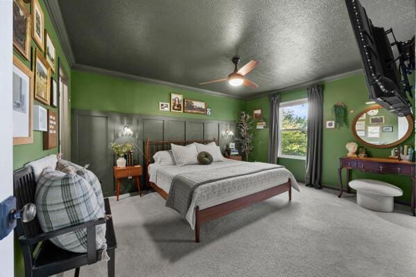 5813 Camhurst Ct, Galloway, OH 43119 - bedroom with crown molding, a textured ceiling, carpet floors, and ceiling fan