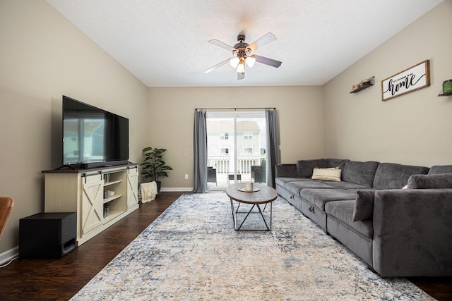 5738 Hayden Run Blvd, Dublin, OH 43016 - living area featuring ceiling fan, dark wood-style floors, and a textured ceiling