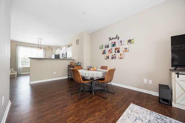 5738 Hayden Run Blvd, Dublin, OH 43016 - dining room featuring dark wood finished floors