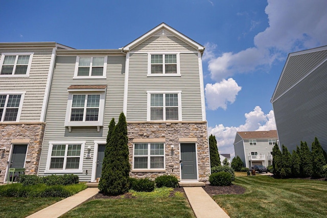 5738 Hayden Run Blvd, Dublin, OH 43016 - view of front of property featuring stone siding and a front yard
