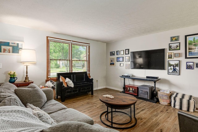 2630 Bella Via Ave, Columbus, OH 43231 - living area with wood finished floors and a textured ceiling