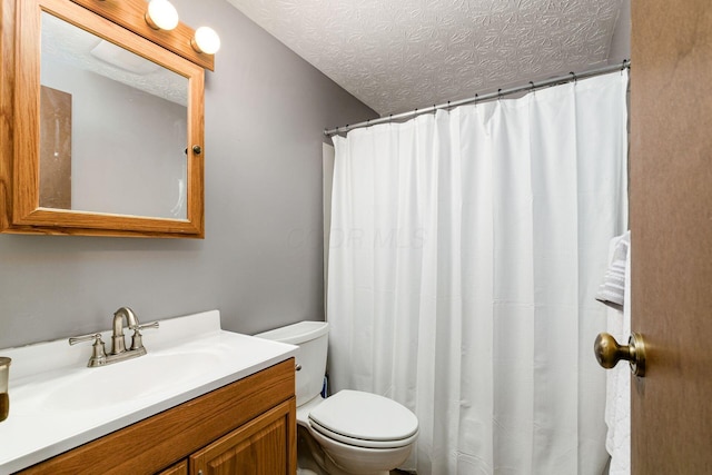 2630 Bella Via Ave, Columbus, OH 43231 - bathroom with vanity, a textured ceiling, and a shower with shower curtain