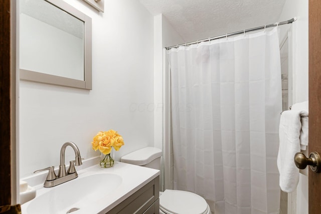 2630 Bella Via Ave, Columbus, OH 43231 - bathroom featuring vanity, a textured ceiling, and a shower with curtain