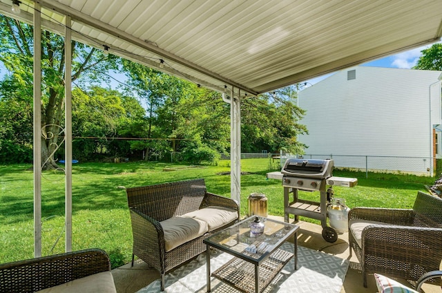 2630 Bella Via Ave, Columbus, OH 43231 - fenced backyard with grilling area, a patio area, outdoor lounge area, and view of wooded area