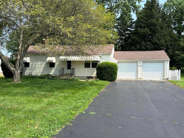 298 N Vernon Ave, Newark, OH 43055 - view of front of home with driveway, a front lawn, a garage, and a shingled roof