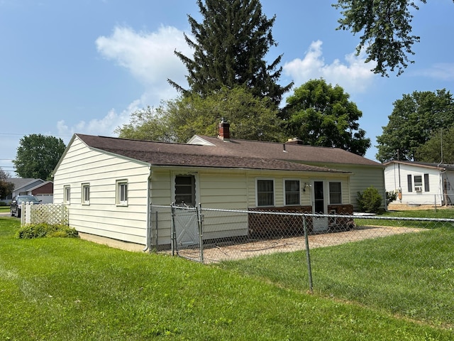 298 N Vernon Ave, Newark, OH 43055 - rear view of house featuring a chimney
