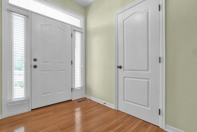 8078 Slate Ridge Blvd, Reynoldsburg, OH 43068 - foyer with light wood-style floors and plenty of natural light