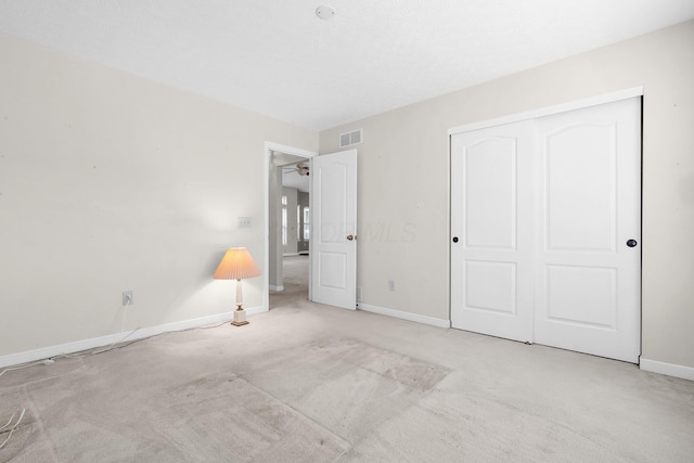 8078 Slate Ridge Blvd, Reynoldsburg, OH 43068 - unfurnished bedroom featuring light colored carpet and a closet