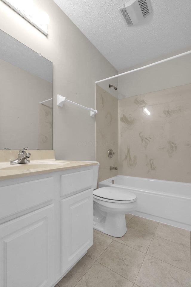 8078 Slate Ridge Blvd, Reynoldsburg, OH 43068 - full bathroom with shower / washtub combination, vanity, tile patterned floors, and a textured ceiling