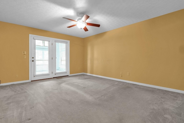 8078 Slate Ridge Blvd, Reynoldsburg, OH 43068 - unfurnished room featuring ceiling fan, carpet flooring, and a textured ceiling