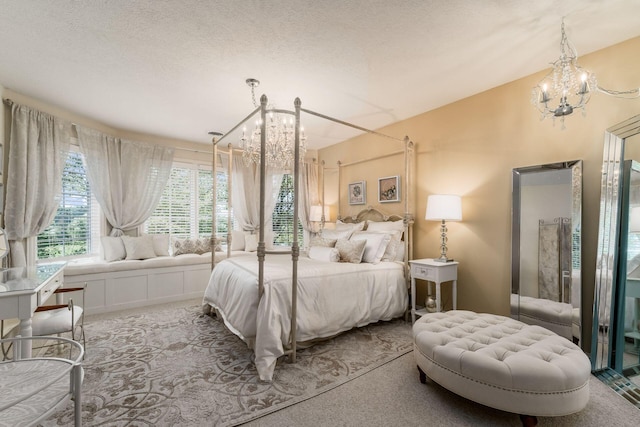 3873 Carters Corner Rd, Sunbury, OH 43074 - bedroom with a chandelier, carpet, and a textured ceiling