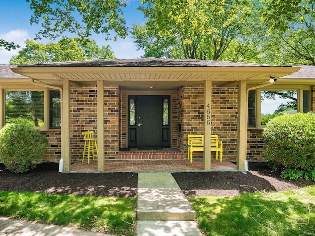 4656 Crompton Dr, Columbus, OH 43220 - property entrance with brick siding and covered porch