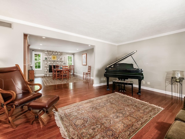 4656 Crompton Dr, Columbus, OH 43220 - living area with wood finished floors, crown molding, and recessed lighting