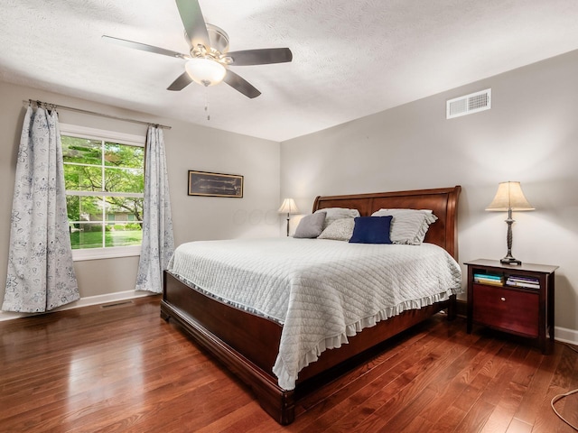 4656 Crompton Dr, Columbus, OH 43220 - bedroom with wood finished floors, a ceiling fan, and a textured ceiling