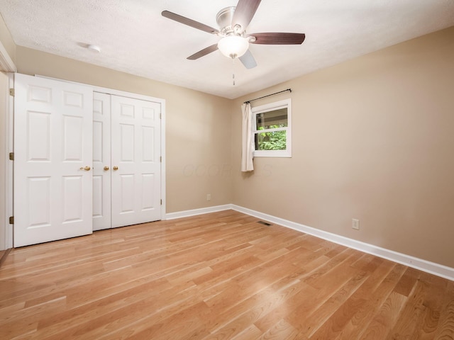4656 Crompton Dr, Columbus, OH 43220 - unfurnished bedroom with light wood-style floors, a closet, and ceiling fan