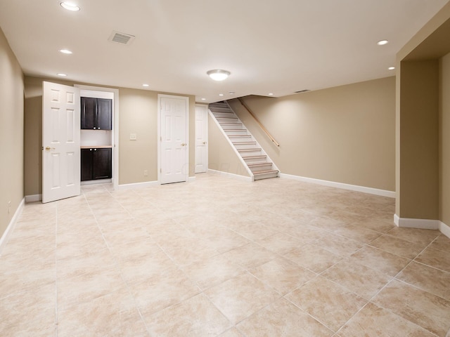 4656 Crompton Dr, Columbus, OH 43220 - finished basement with recessed lighting, light tile patterned floors, and stairs