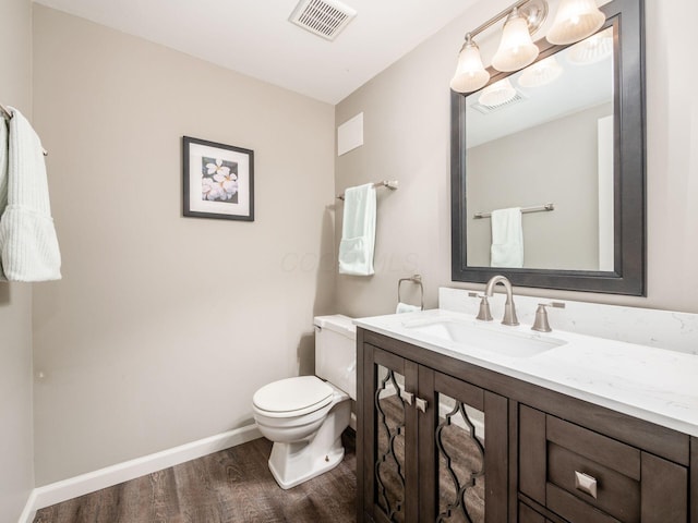 4656 Crompton Dr, Columbus, OH 43220 - half bath featuring wood finished floors and vanity
