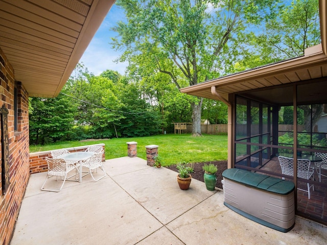 4656 Crompton Dr, Columbus, OH 43220 - view of patio / terrace featuring outdoor dining area, a sunroom, and view of scattered trees