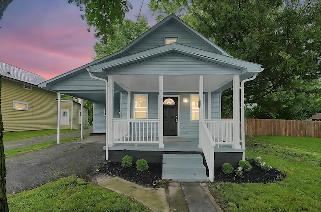 540 Park St, Marion, OH 43302 - view of front of property with a porch, driveway, and an attached carport