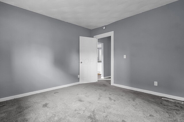 540 Park St, Marion, OH 43302 - carpeted spare room featuring baseboards