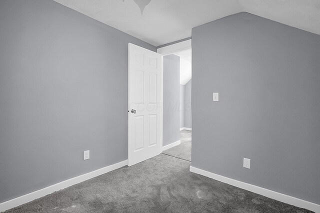 540 Park St, Marion, OH 43302 - unfurnished bedroom with vaulted ceiling and carpet floors