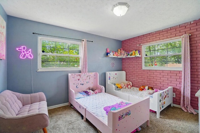 3722 Florian Dr, Columbus, OH 43219 - bedroom with carpet flooring, multiple windows, brick wall, and a textured ceiling