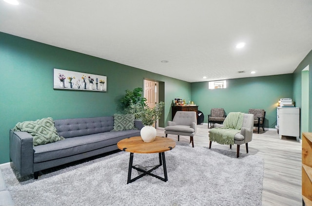 3722 Florian Dr, Columbus, OH 43219 - living room featuring wood finished floors and recessed lighting