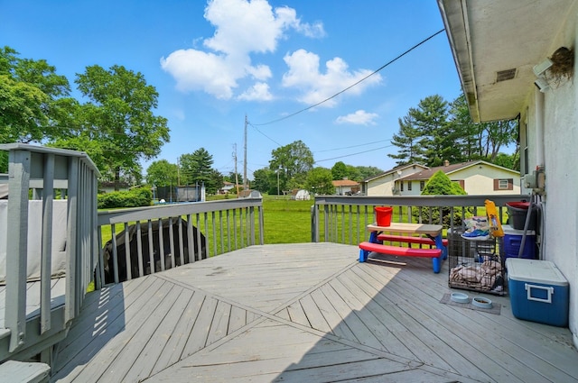 3722 Florian Dr, Columbus, OH 43219 - wooden deck featuring a lawn and a trampoline