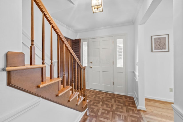1295 Castleton Rd N, Columbus, OH 43220 - entryway with stairs and crown molding