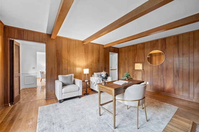 1295 Castleton Rd N, Columbus, OH 43220 - office area featuring beam ceiling, wood walls, and light wood-style floors