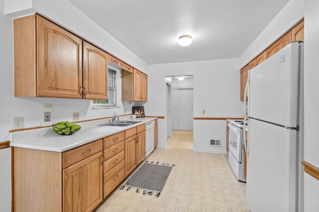 1295 Castleton Rd N, Columbus, OH 43220 - kitchen featuring white appliances and light countertops