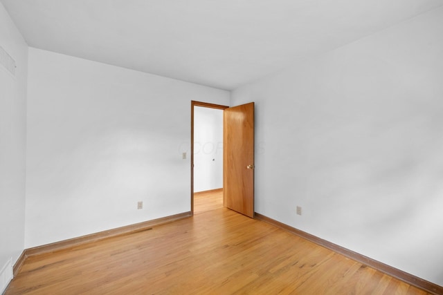 1295 Castleton Rd N, Columbus, OH 43220 - unfurnished room featuring light wood finished floors