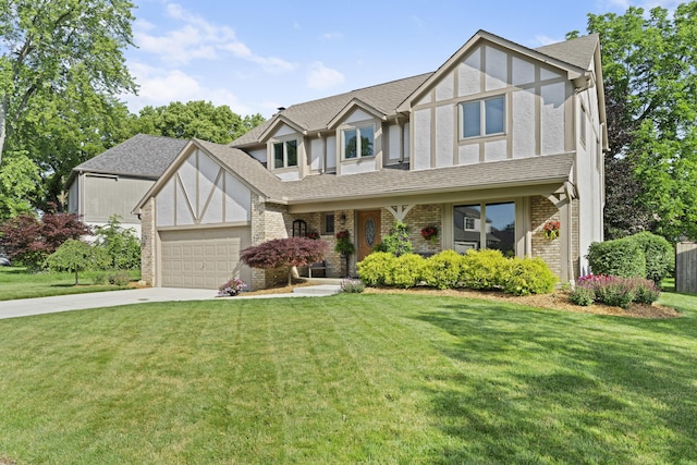 1292 Churchbell Way, Columbus, OH 43235 - tudor home featuring concrete driveway, an attached garage, a front lawn, brick siding, and roof with shingles