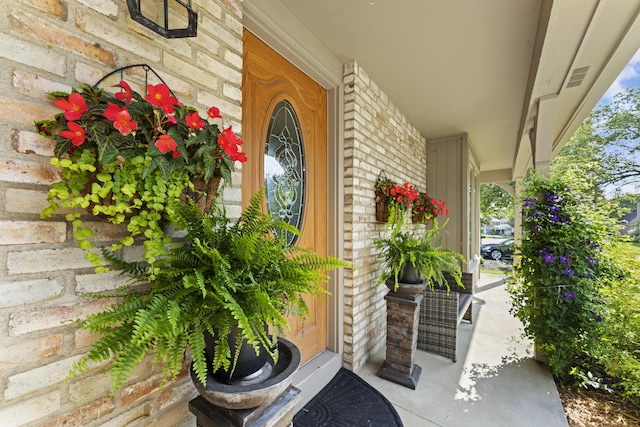 1292 Churchbell Way, Columbus, OH 43235 - view of exterior entry with a porch and brick siding